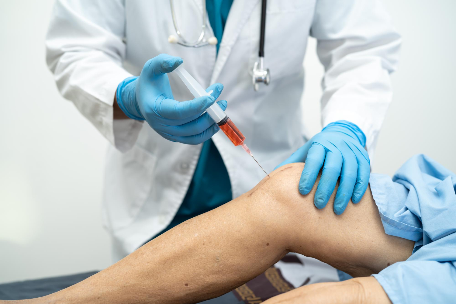 asian-doctor-inject-hyaluronic-acid-platelet-rich-plasma-into-knee-senior-woman-walk-without-pain